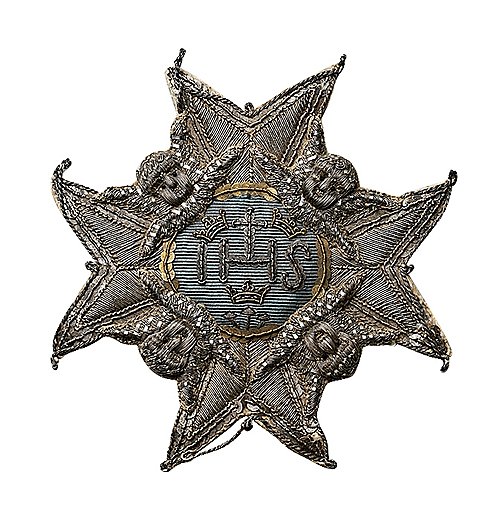Звезда Королевского ордена серафимов (шитая). Конец XVIII -- начало XIX века. Серебро, бумага, репс, мишура