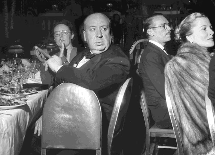 С Альмой Ревиль на ужине в честь журналистки Луэллы Парсонс, 1948 