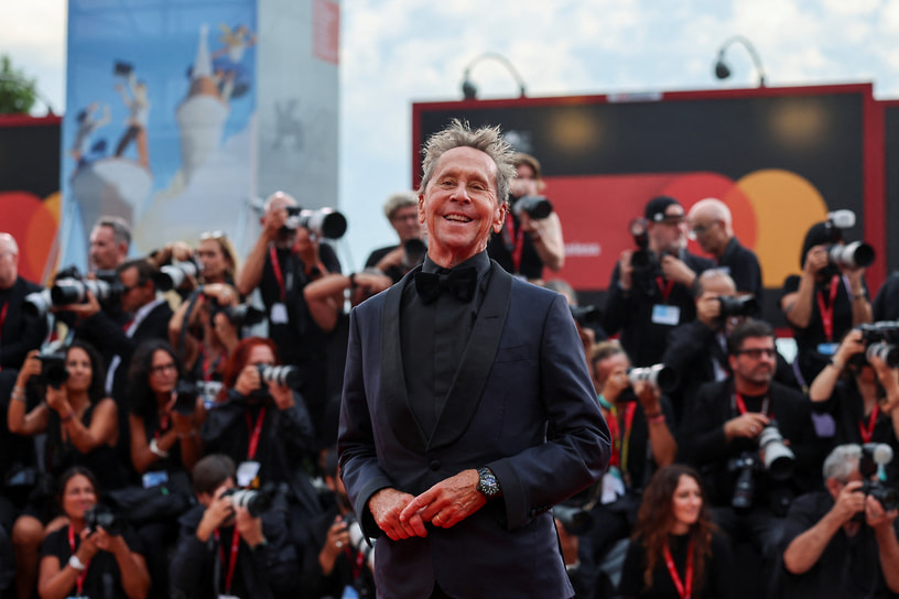 Продюсер Брайан Грейзер 