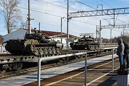 Genre photos. Transportation of tanks at the railway station Levashovo.