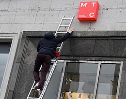 The new logo of the MTS company on one of the buildings in Moscow. MTS office.