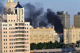 Fire in the center of Moscow near the Smolenskaya metro station. Smoke from the fire.