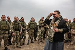 The communion of soldiers of the Russian Army in the Zaporozhye direction during a special military operation of the Russian Armed Forces