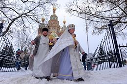 Feast of the Epiphany. Epiphany bathing in Olga's pond near the Peterhof Cathedral of the Holy Apostles Peter and Paul