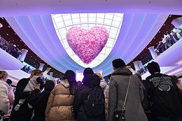Genre photographs. Valentine's Day in the central atrium of the Riviera shopping center