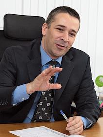 Президент 'ДжиИ Мани Банка' Ричард Гаскин в офисе бизнес-центра 'Аврора'