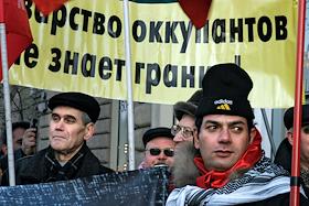 Митинг против патронирования правительством США социально-экономической блокады арабского народа Палестины со стороны Израиля напротив посольства США