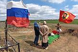 Commemoration of relatives and friends on the day of Krasnaya Gorka and on the eve of Radonitsa at a cemetery in the suburbs of Donetsk