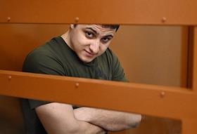 Рассмотрение по существу уголовного дела в отношении заключившего сделку со следствием Ростислава Журавлева - одного из трех обвиняемых в подрыве машины экс-офицера Службы безопасности Украины (СБУ) Василия Прозорова во Втором западном окружном военном суде