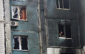 Обстрел многоквартирного дома в Ленинском районе Донецка, в результате которого погибли два человека