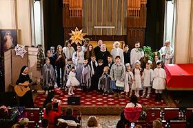 Жанровые фотографии. Рождественское богослужение в католическом кафедральном соборе Преображения Господня в Красноярске