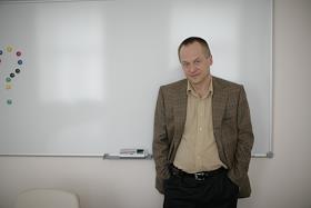 Бывший генеральный директор УК 'ОФГ ИНВЕСТ' Андрей Подойницын во время интервью