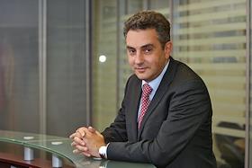 Президент компании AIG Life Russia Александр Зарецкий во время интервью