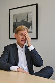 Председатель совета директоров компании 'Кредит-Март' Джеймс Кук в бизнес-центре 'Шереметьевский'