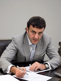 Владелец 'РАТМ холдинг' Эдуард Таран, в офисе компании 'РАТМ цемент'