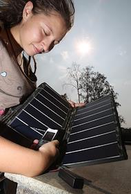 Продукция компании 'Нью Энерджи'. Зарядные устройства для мобильных телефонов и плееров на солнечных батареях