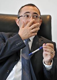 Генеральный директор туроператора 'Корал Трэвел' Джошкун Юрт в офисе компании