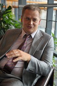 Начальник Управления ипотечного кредитования ЮниКредит Банка Иван Веденисов во время интервью.
