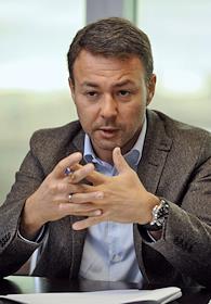 Генеральный директор ГК 'Связной' Денис Людковский в бизнес-центре 'Омега Плаза'